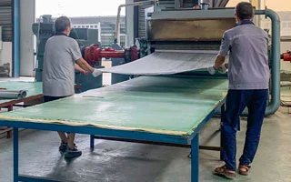 first Compressed Sheet Material